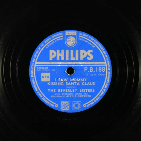 I Saw Mommy Kissing Santa Claus / Triplets