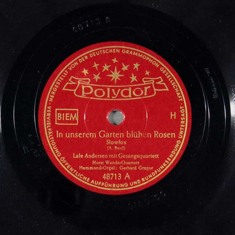 In unserem Garten blühen Rosen / Mit zwei Augen wie den deinen